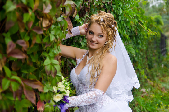 Wedding bouquet in hand charming bride.