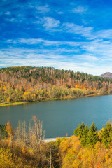 Fototapeta na wymiar Lake Bajer, colorful autumn landscape, Fuzine, Gorski kotar, Croatia 