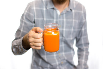 man holding a carrot juice diet is a healthy diet is useful
