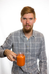 man holding a carrot juice diet is a healthy diet is useful