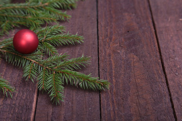 Christmas decoration tree with ball on wooden background