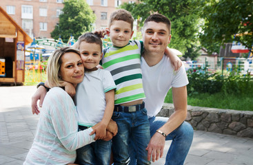 Boys with their parents for a walk