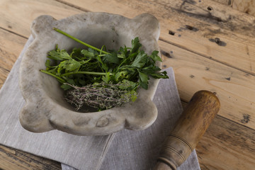 Pestle, mortar and herbs