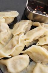 Chinese food. Boiled dumplings with pork and vegetables