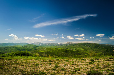 Fototapeta premium Mountains and clouds 