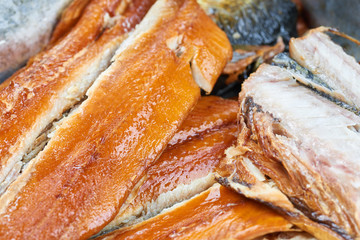 Set of smoked fish in a tin pan