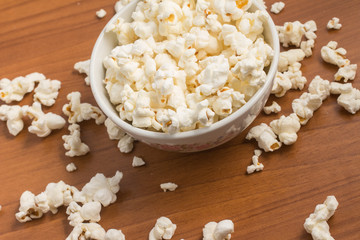 Popcorn into a bowl