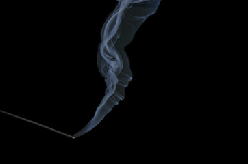 Incense Smoke on Black Background