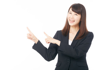 女性　ビジネス　指差し