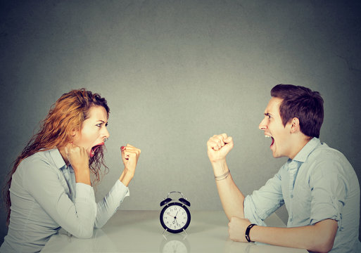 Man and woman mad angry with each other having disagreement screaming