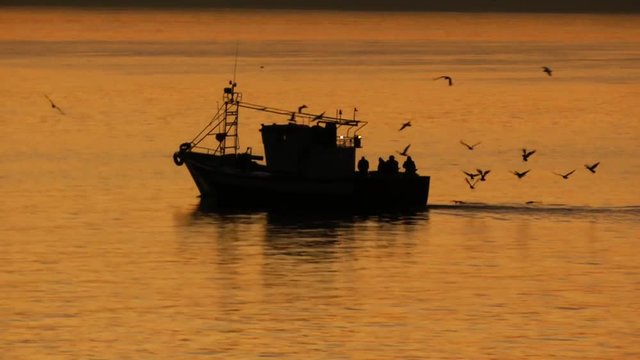 silhouette of a fisherboat in morocco