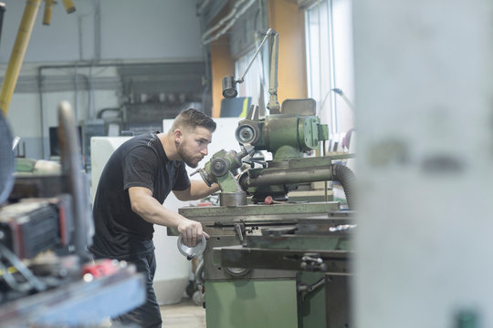 Man working in grinding workshop