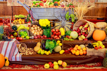 Thanksgiving day Tray with pumpkin and different ripe vegetables inside