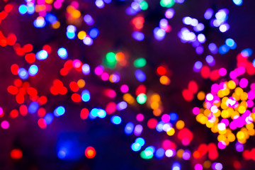 Bokeh or defocused christmas lights background..