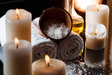 Spa treatment over dark background.