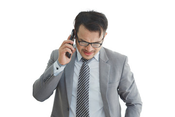 Businessman wearing suit and talking modern smartphone, employer