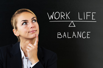 Businesswoman Thinking About Balancing Work Life