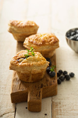 Puff pastries with cheese and berry filling