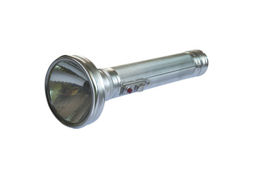 Old metal flashlight isolated on white background.