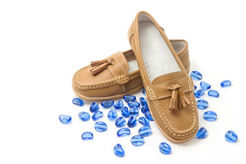 Pair of woman's leather shoes isolated on white background