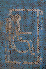 handicapped sign on diamond plate