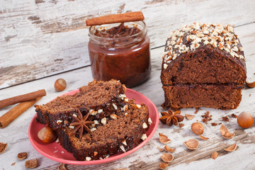 Gingerbread or dark cake with chocolate, cocoa and plum jam, delicious dessert