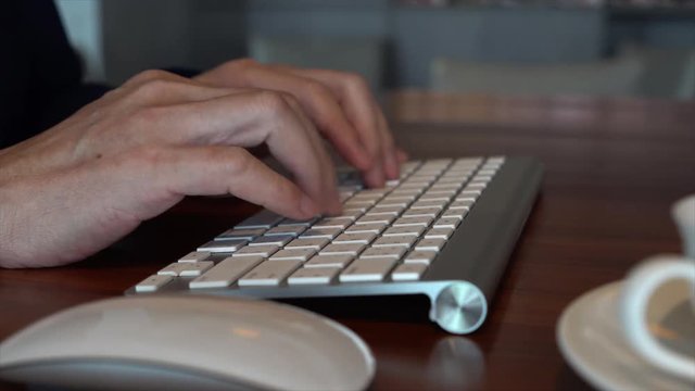 This video is about Close Up Of Businessman Typing 02