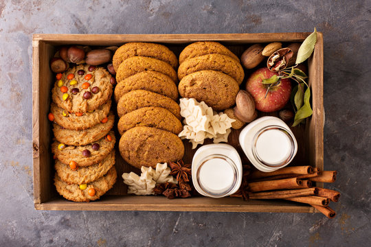 Box With Variety Of Fall Cookies And Milk Bottles