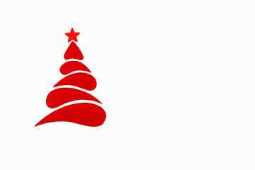 The New Year and Christmas conceptual tree made of a color cardboard. Isolated on a white background.