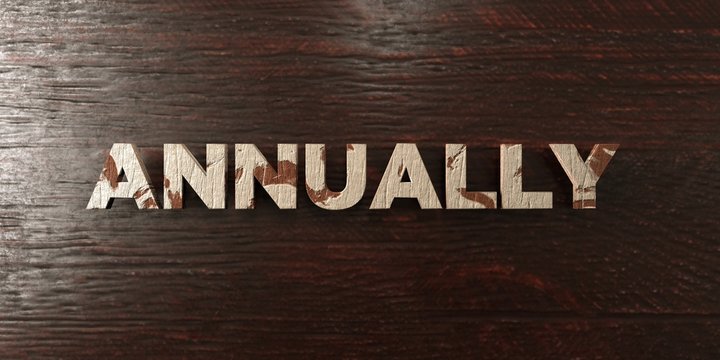 Annually - grungy wooden headline on Maple  - 3D rendered royalty free stock image. This image can be used for an online website banner ad or a print postcard.