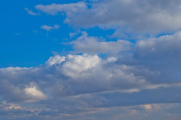 White clouds in a deep blue sky