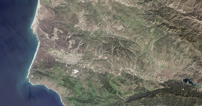 High-altitude overflight aerial of Vandenberg Air Force Base and Santa Maria, CA. Clip loops and is reversible. Elements of this image furnished by NASA 