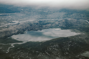 Aerial view on nature landscape to lake and mountains