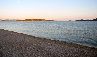 Pebble beach landscape in Vodice, Adriatic Sea, Croatia.