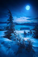 Moon rise above Carpathian mountain village