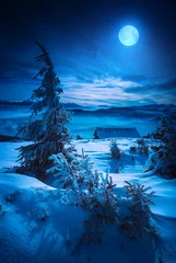 Foto auf Acrylglas Winter Moon rise above Carpathian mountain village