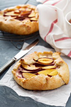 Open pie with plums