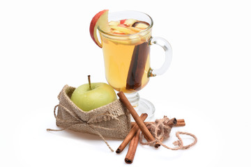 Glass of delicious glintwein with apple