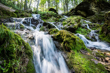 rocky waterfall in summer