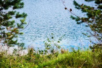 calm lake with reflections of clouds  in summer