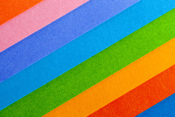 Background of colorful paper  parallel diagonal stripes