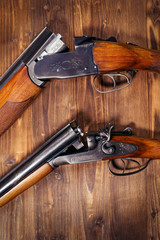 Shotgun on wooden background