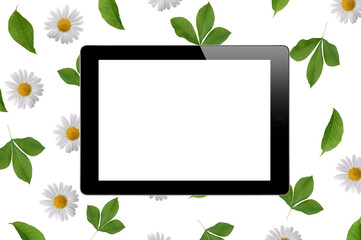 Black tablet with empty screen on floral background pattern with