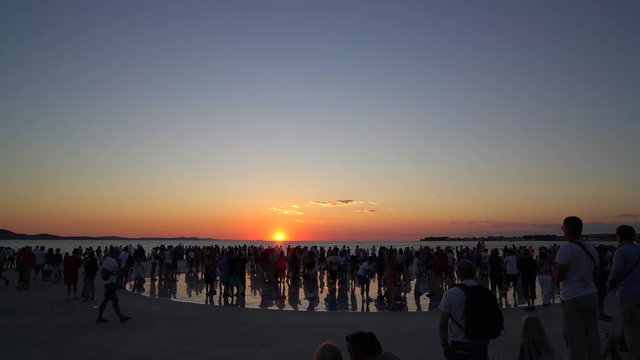 People silhouette on colorful sunset