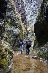 Couple of hikers in the canyon