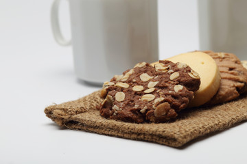 The chocolate cookies and coffee cup set for relax and break from meeting