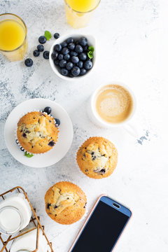 Bright and airy breakfast with blueberry muffin