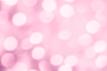 Abstract Christmas glitter vintage lights background. Dark Gold