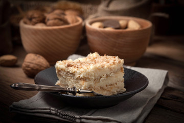Homemade cake with ground walnut and coconut.