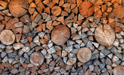 Chopped firewood. Wooden background. Lumber